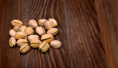 pistachios on  wooden  background