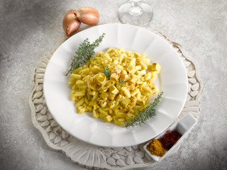 malloreddus pasta with mozzarella onions and saffron