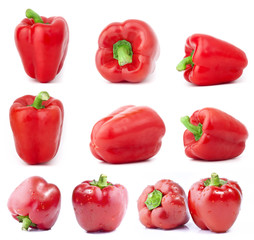 Collection of red bell peppers isolated on white background