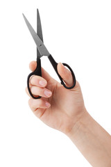 Small steel scissors in hand