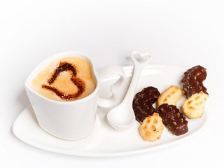 Tasse Kaffee mit Gebäck