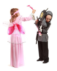 Young girl as magic fairy and boy dressed as a Knight isolated - 38059612