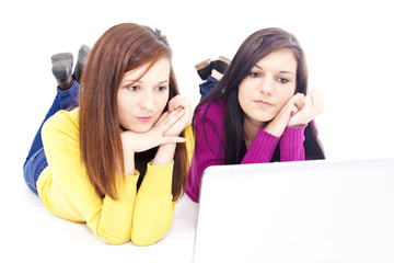 Girls in front of laptop