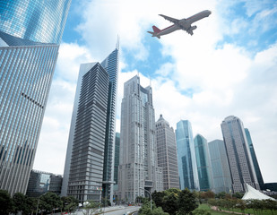 Fototapeta na wymiar shanghai financial district and airplane