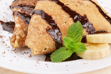 Crepes with chocolate sauce