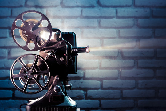 old film projector with dramatic lighting