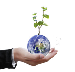 Holding a glowing earth globe in his hand