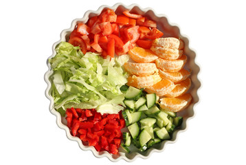 Dish of 5 varieties of salad and fruit.
