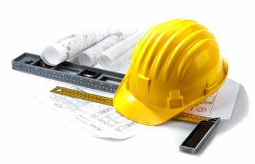 isolated hard hat with blueprints and rulers on white - 38074002