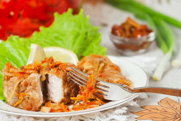 Fried striped mullet on a plate