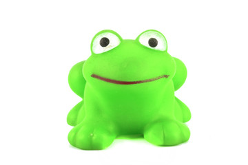green frog toy on white