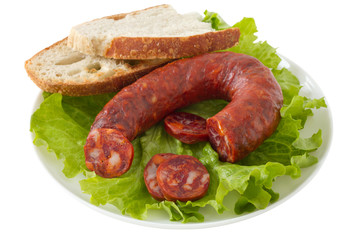 sausage with bread on the plate