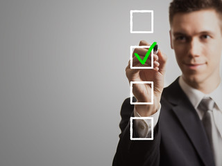 businessman - tick off checklist
