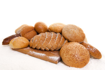 bread on the baking board sprinkled with flour