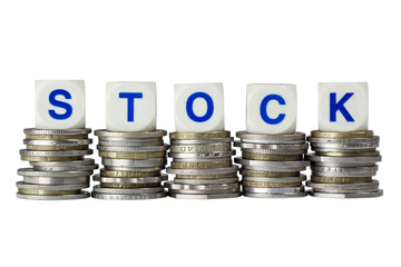 Stacks of coins with the word STOCK isolated
