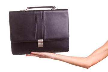 Woman hands and suitcase.