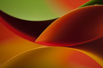 abstract colored paper structure on orange background