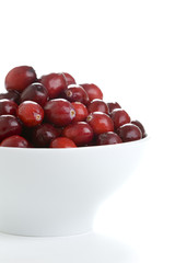 fresh cranberries in a white bowl