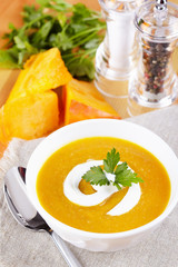Pumpkin soup on the served table