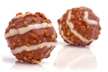 Sweet chocolate balls filled with hazelnuts.