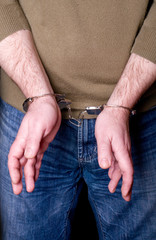 hands in handcuffs