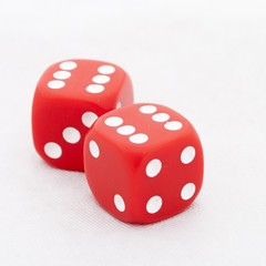 Two red dices on clear background