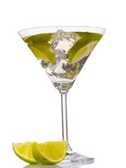cocktail with ice, lemon and green lime isolated on white