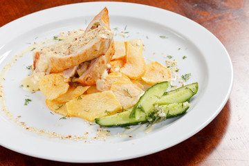 stuffed chicken with potatoes