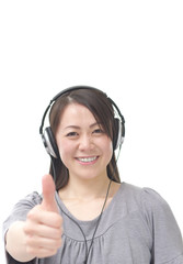 Asian woman listening music