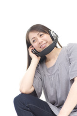 Asian woman listening music