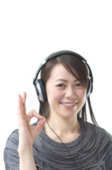 Asian woman listening music