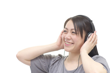 Asian woman listening music