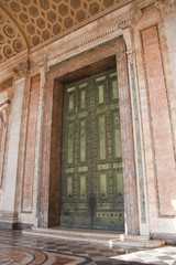Fototapeta na wymiar A doorway on the church of San Giovanni in Laterano