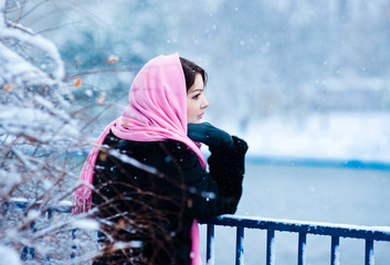 Young beautiful girl in winter clothing