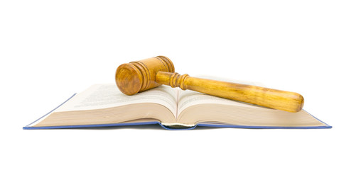 open book and gavel on white background