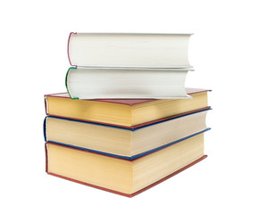 stack of books on white background close-up