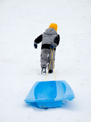 Boy playing in winter