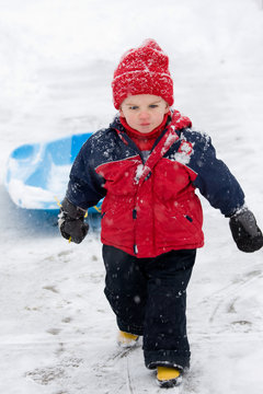 Boy Pulling Sled