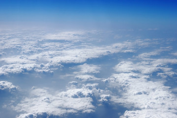 Fototapeta na wymiar blue sky clouds view from aircraft airplane sunny day