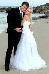 Naklejka premium Lovely Wedding Couple at the Sea Side