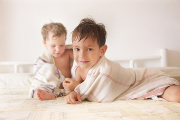 two kids after having bath