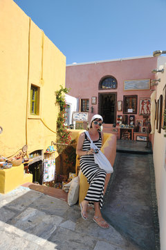 Greek woman on the streets of Oia, Santorini, Greece