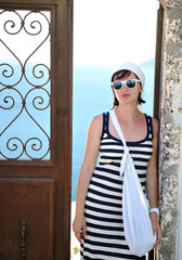 Greek woman on the streets of Oia, Santorini, Greece