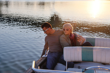 Fototapeta premium couple in love have romantic time on boat