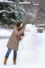 Happy middle age woman having fun in winter