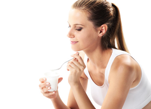 Woman Eating Yogurt