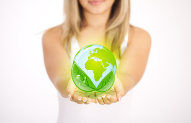 Woman hands holding ECO sign