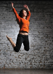 Girl in sportswear jumping