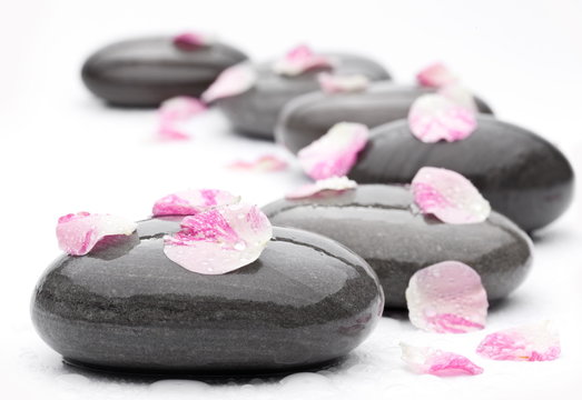 Spa stones with rose petals