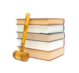 books and gavel on white background